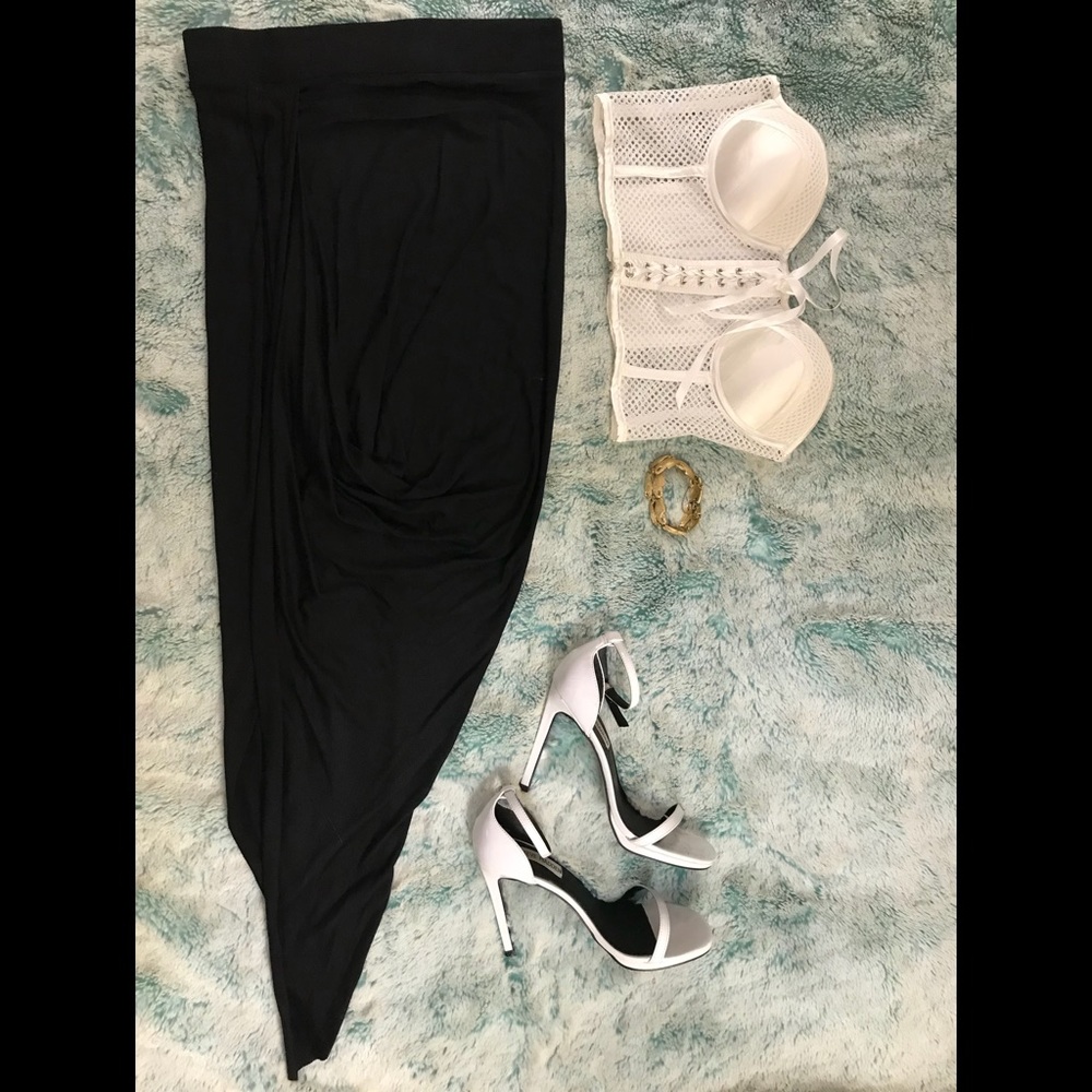 Black asymmetrical skirt.